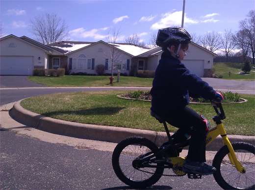 Owen rides a bike